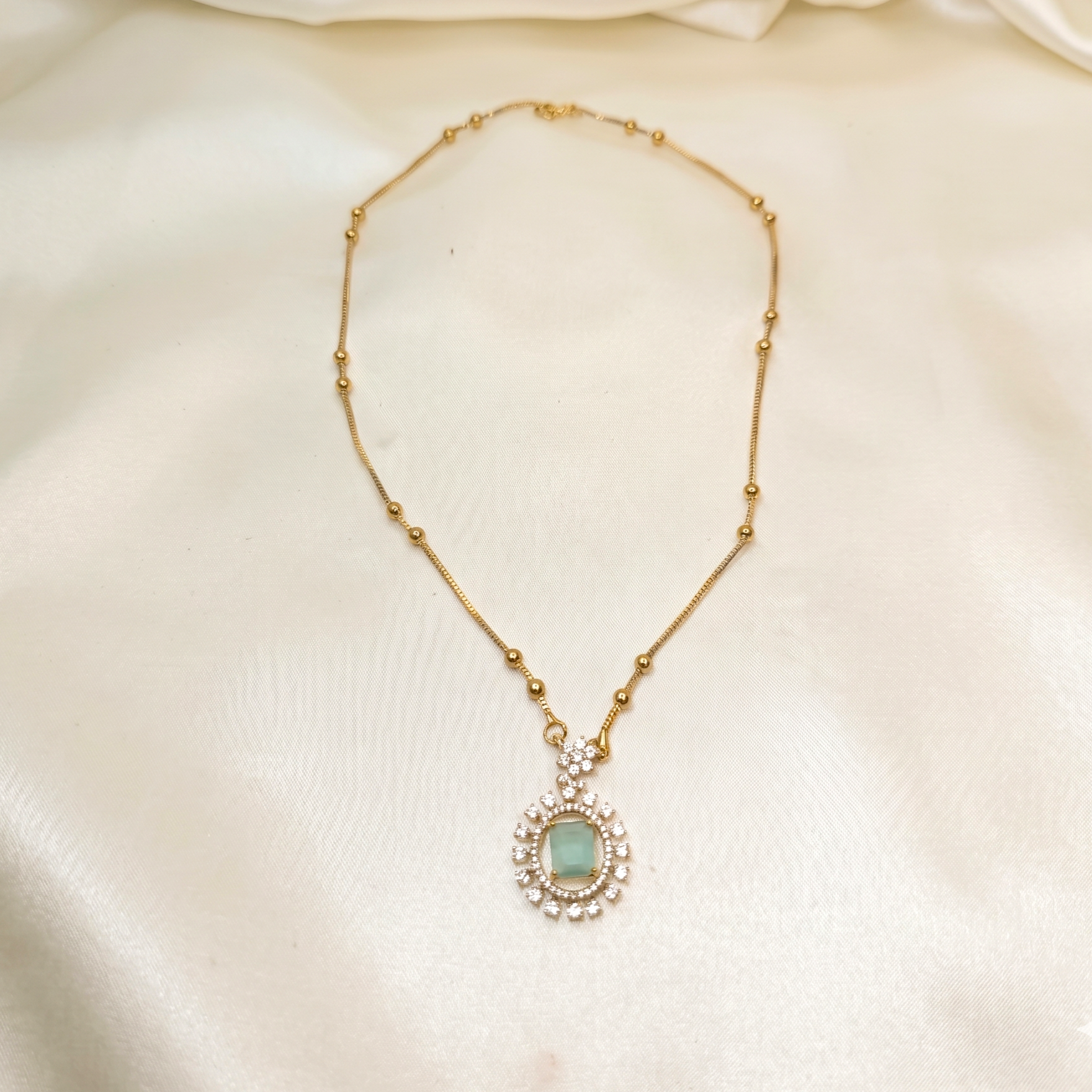 Gold Chain necklace with a green affordable girls pendant 