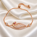 rose gold tennis slider peacock ad chain bracelet